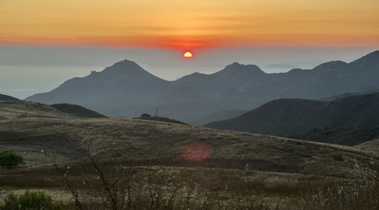 Sunsetting over mountains