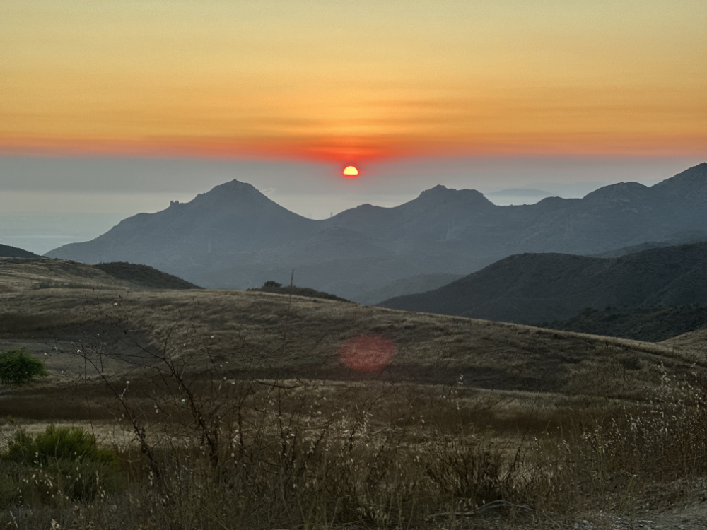 Sunsetting over mountains